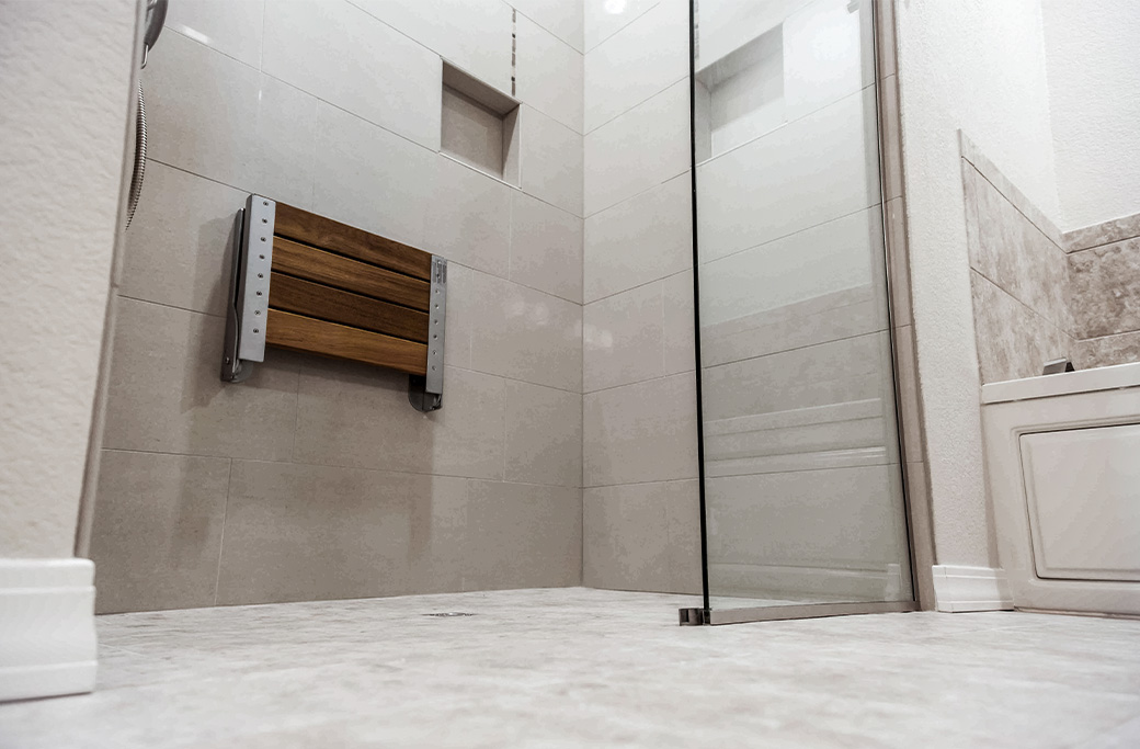 Accessible walk-in shower with built-in bench and safety features for aging in place