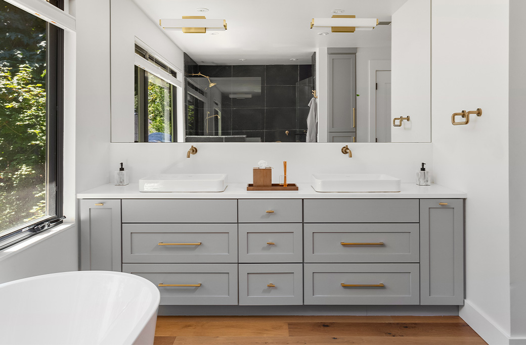 Custom bathroom vanity with drawers and storage in a Rhode Island home
