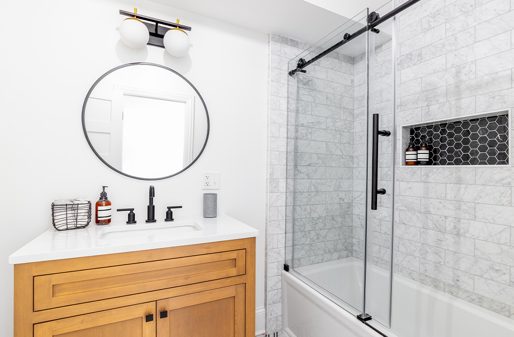 Custom bathroom vanity and built-in shower storage solutions