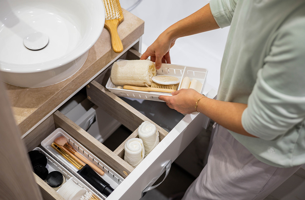 Small bathroom vanity with built-in storage designed to maximize space