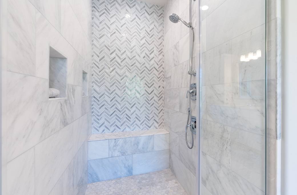 Accessible bathroom remodel with low-threshold walk-in shower and seating