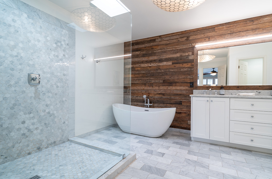 Bathroom remodel with coordinated shower and floor tile in a Rhode Island home