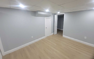 Finished basement with seating and recreation space